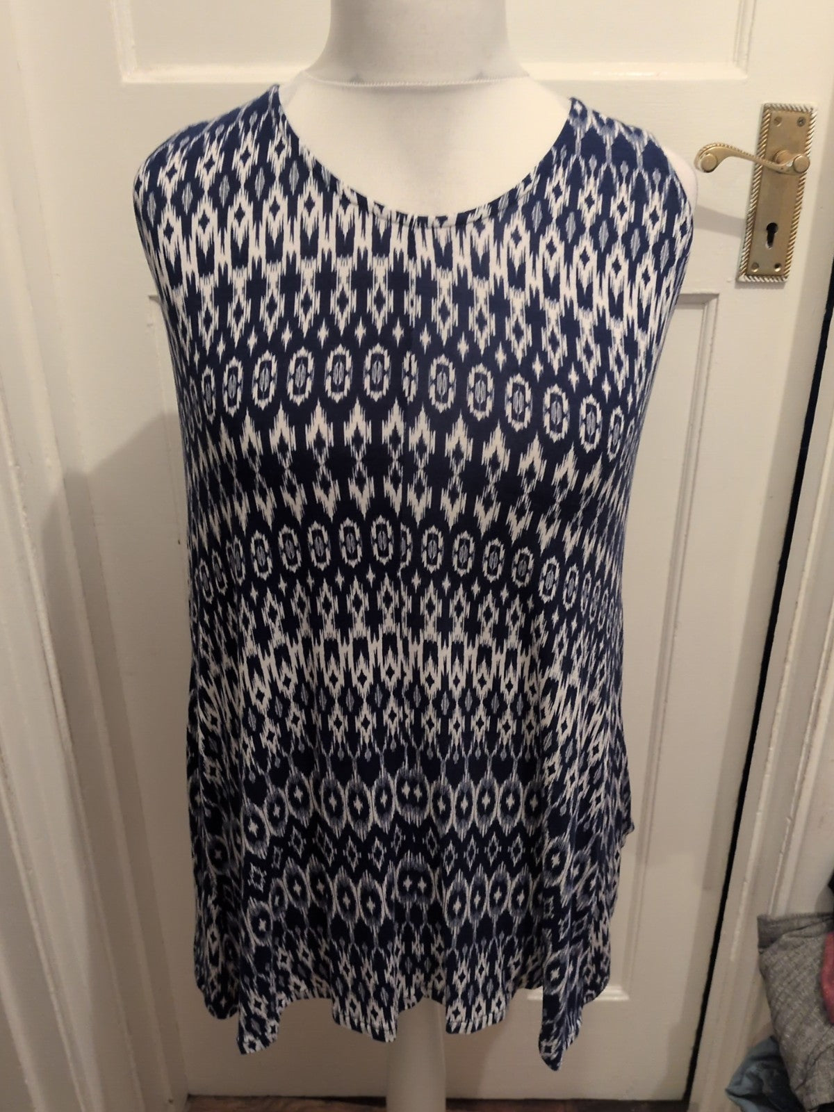 Medium Blue And White Patterned Sleeveless Blouse
