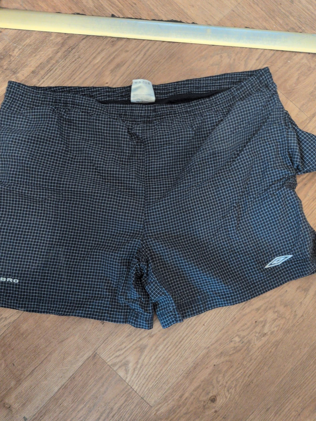 Umbro Large Navy Check Swim Shorts Fading