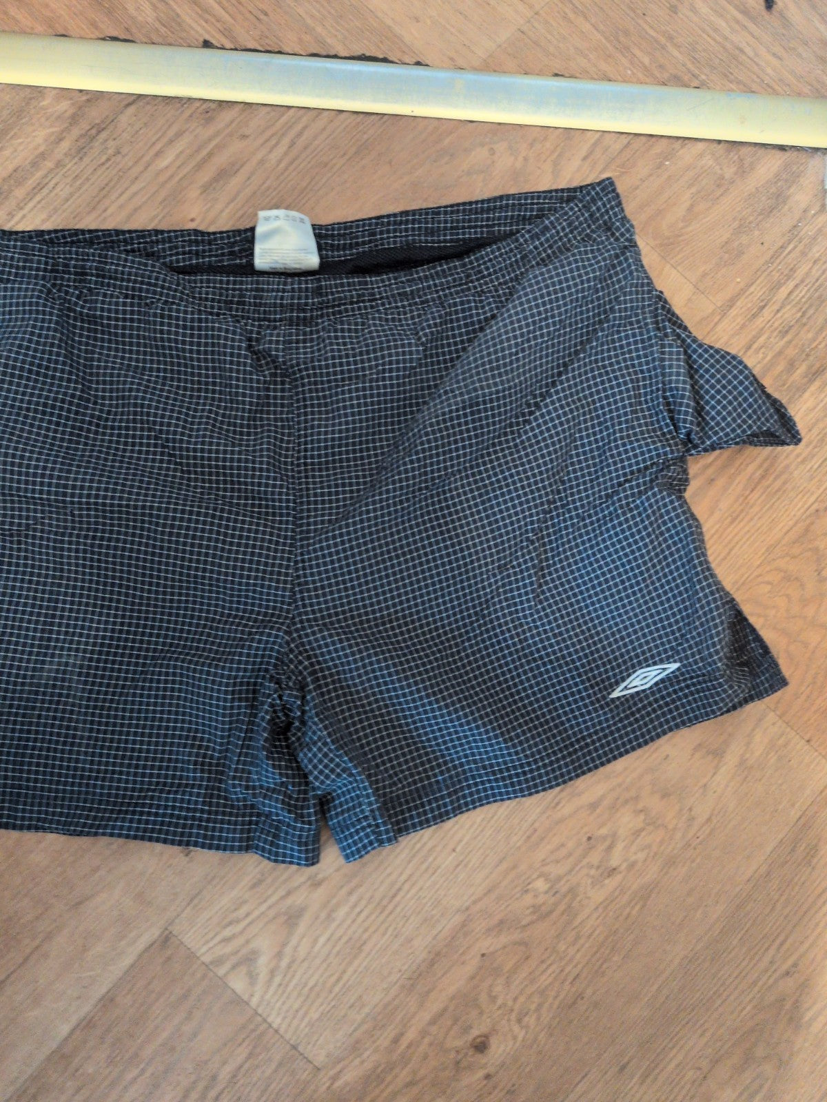 Umbro Large Navy Check Swim Shorts Fading