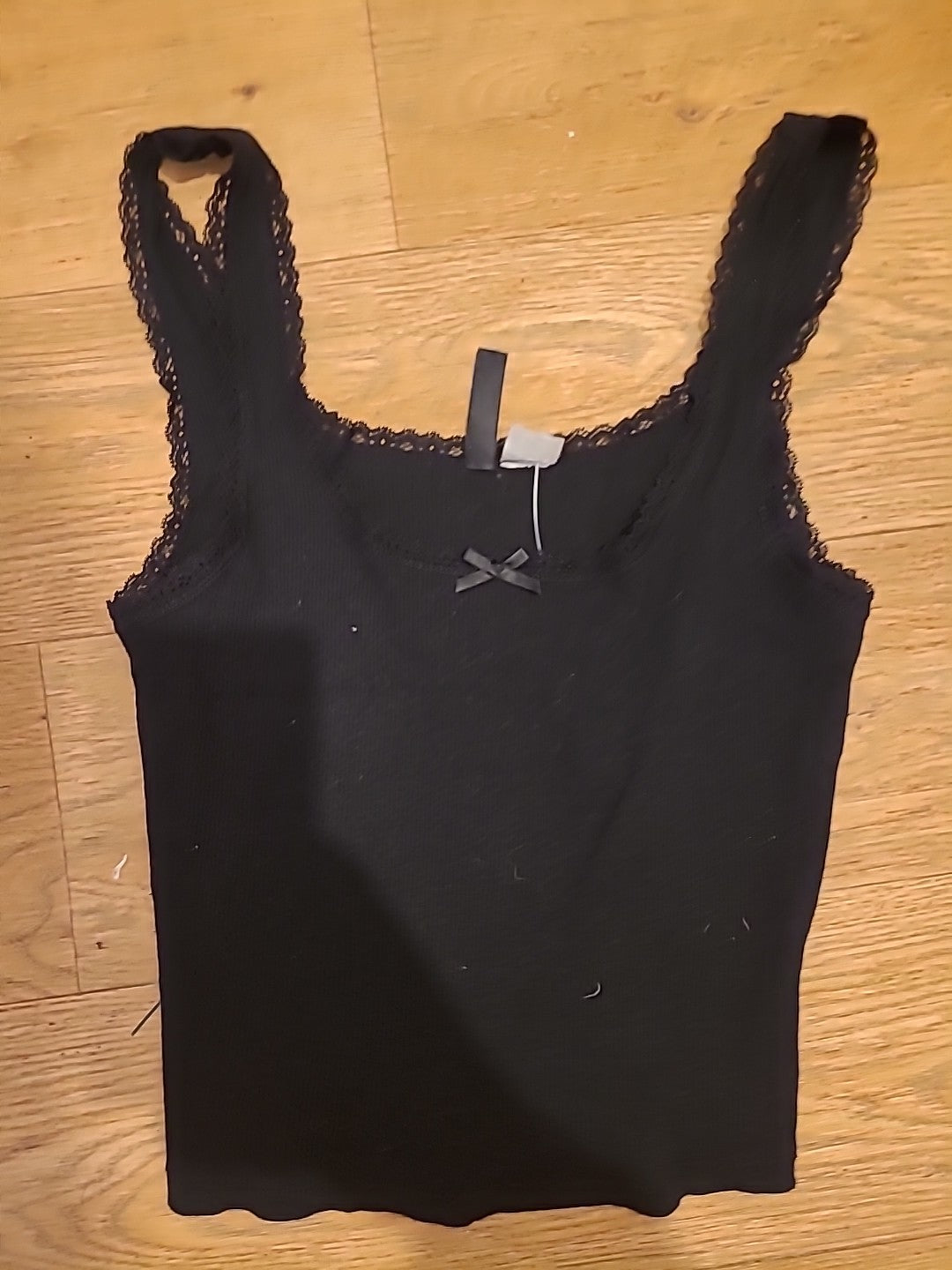 Ladies Divided Size Small Black Sleeveless Frilly Hem Top