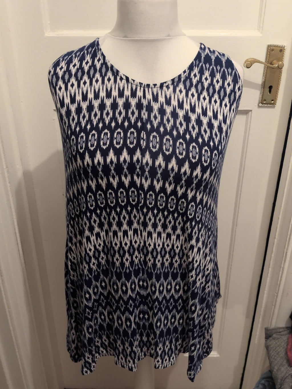 Medium Blue And White Patterned Sleeveless Blouse