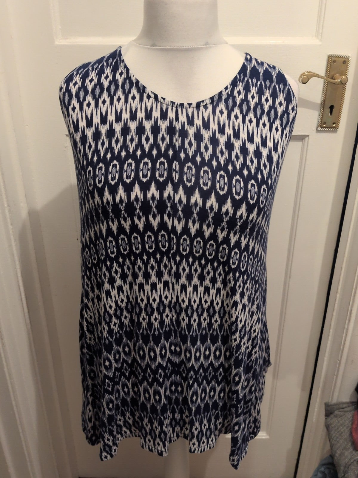 Medium Blue And White Patterned Sleeveless Blouse