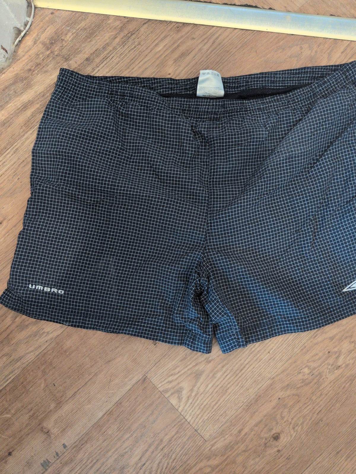 Umbro Large Navy Check Swim Shorts Fading