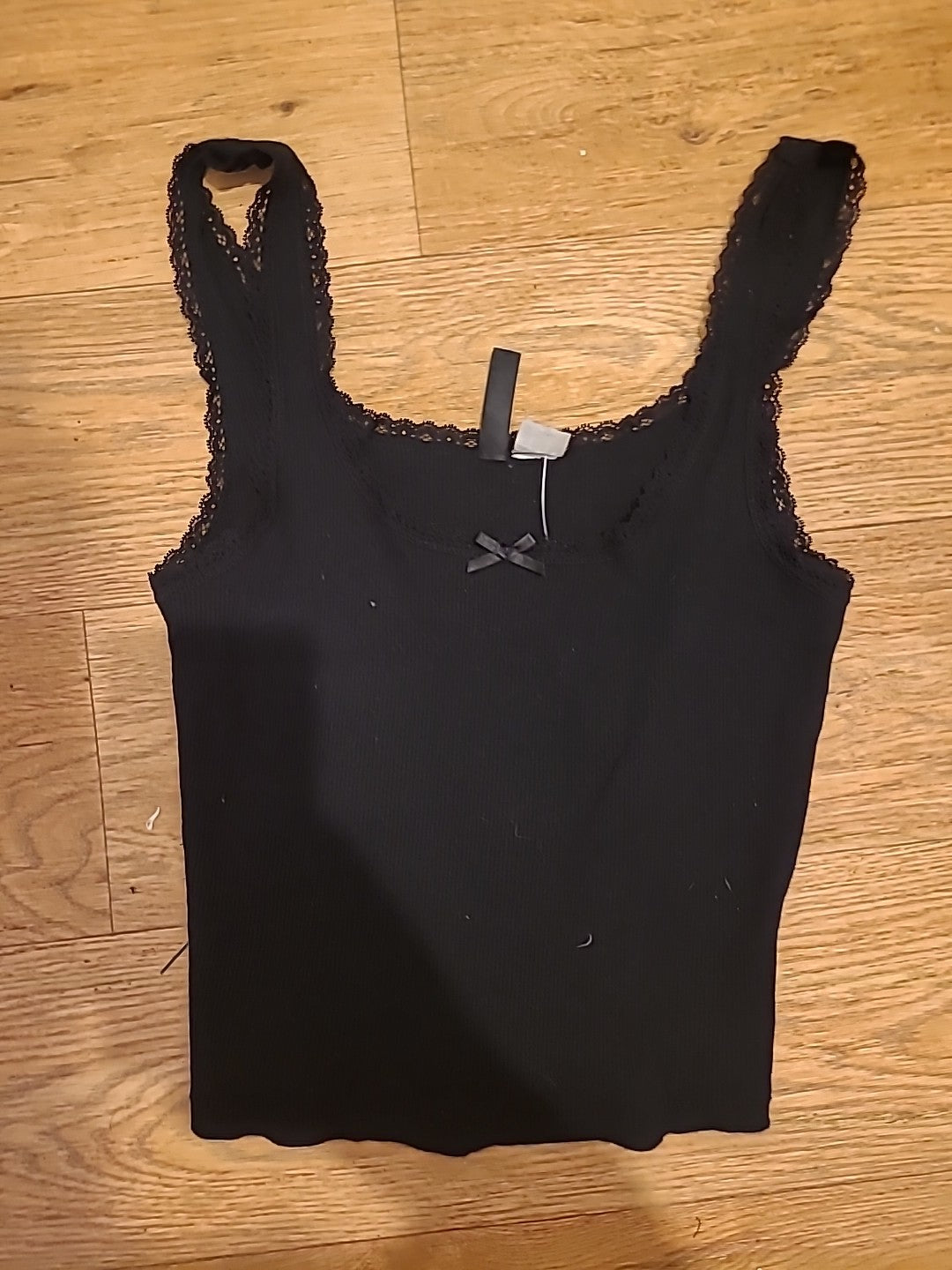 Ladies Divided Size Small Black Sleeveless Frilly Hem Top