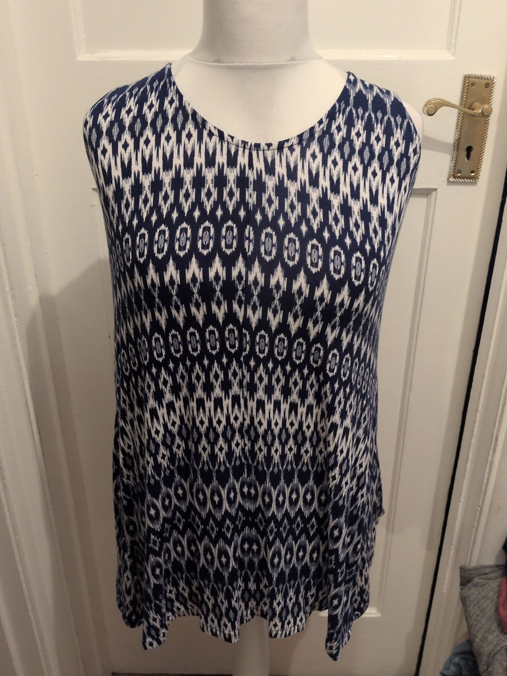 Medium Blue And White Patterned Sleeveless Blouse